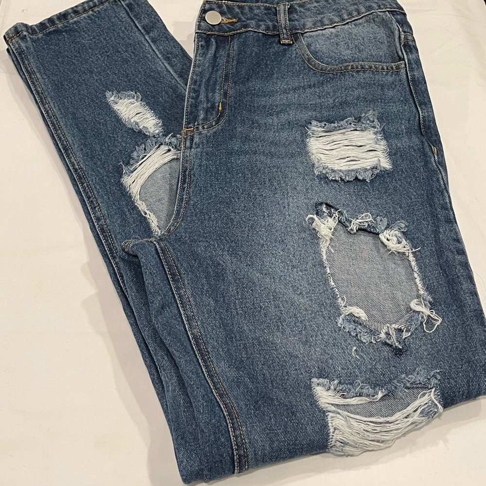 Fashion Nova ripped jeans. NWOT
